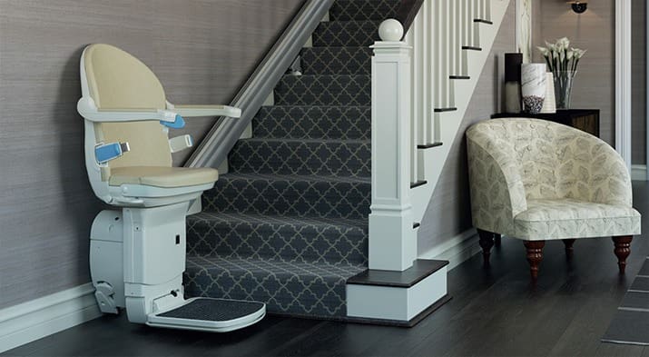 straight stairlift installed in home with grey carpets